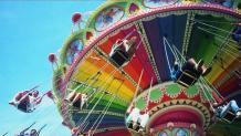 Riders on the Flying Carousel ride