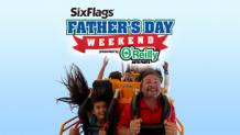 Dad and daughter on fireball with blue sky