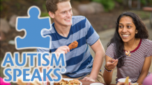 guests eating in picnic grove at Autism Awareness day with Autism Speaks logo overlay