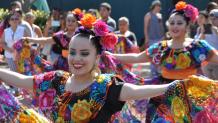Group of cultural dancers during Festival Latino