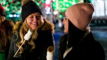 girls roasting marshmallows at Holiday in the Park