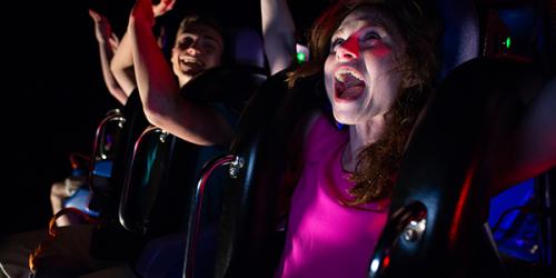 Guests riding CYBORG™ Hyper Drive