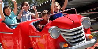 children enjoying kid coaster