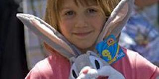 Child with Bugs Bunny Toy Child with Bugs Bunny Toy